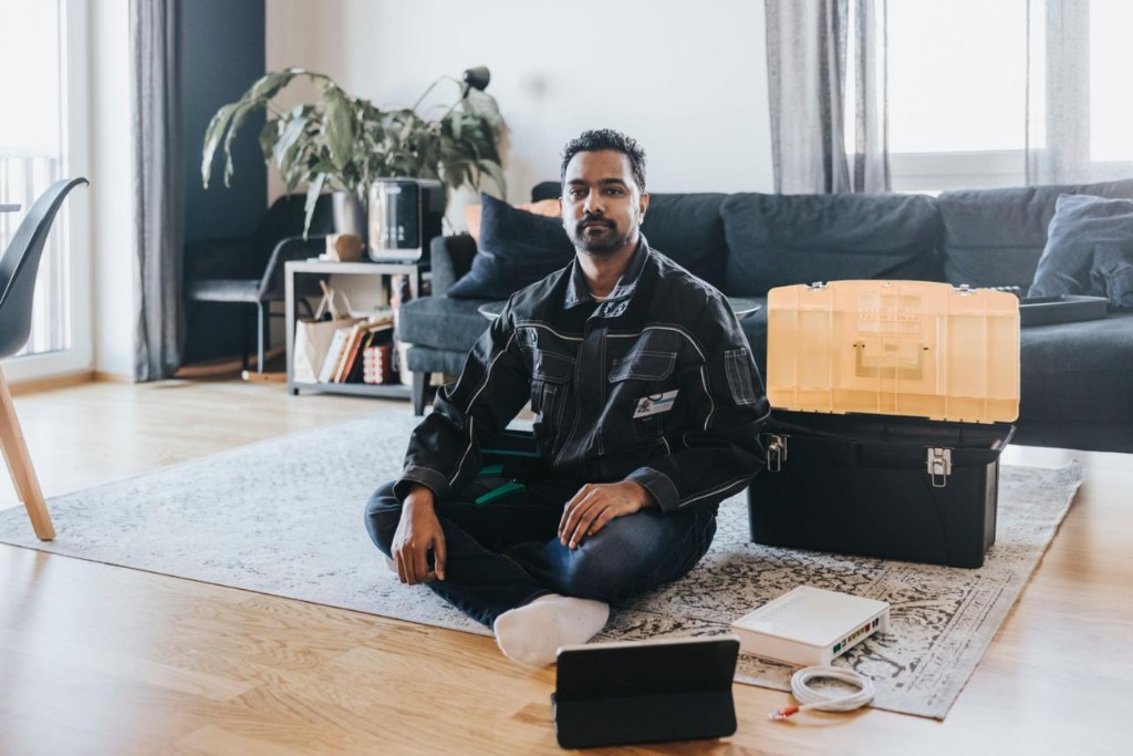Technician installing fiber — industrial and workshop connectivity at Vatva GIDC